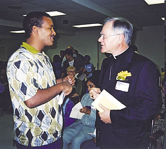 Archbishop of Winnipeg, Rt. Rev. James Weisgerber, at the annual multifaith prayer service of Our Lady of Perpetual Help Church where he gave the keynote address. Winnipeg, 2001.