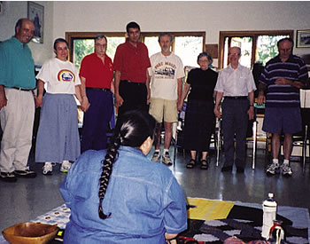 At the 2001 North American Interfaith Network (NAIN) conference held in Winnipeg, Cree elder Myra Laramee conducts a Native ritual that includes the participation of interfaith activists from across North America.