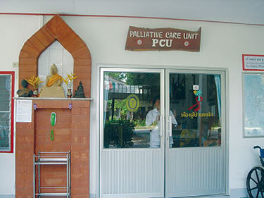A statue of the Buddha sits in the alcove outside the palliative care unit at the Catholic relief centre in Rayong, Thailand.